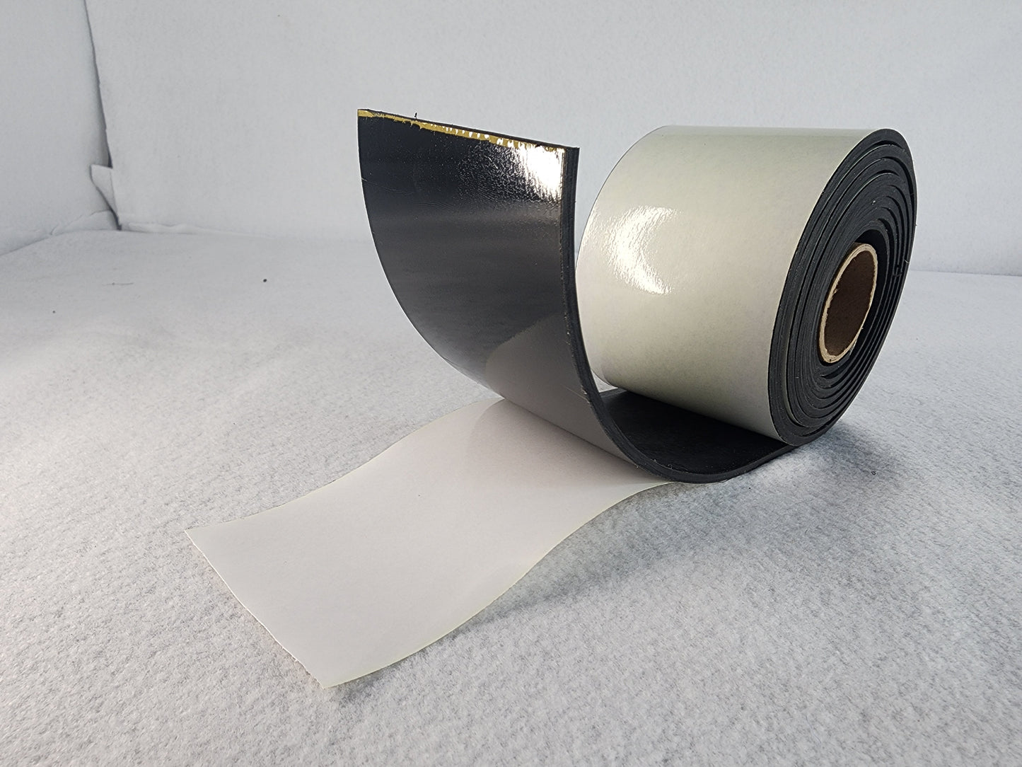 Solid Neoprene Duro Slitted Roll with adhesive